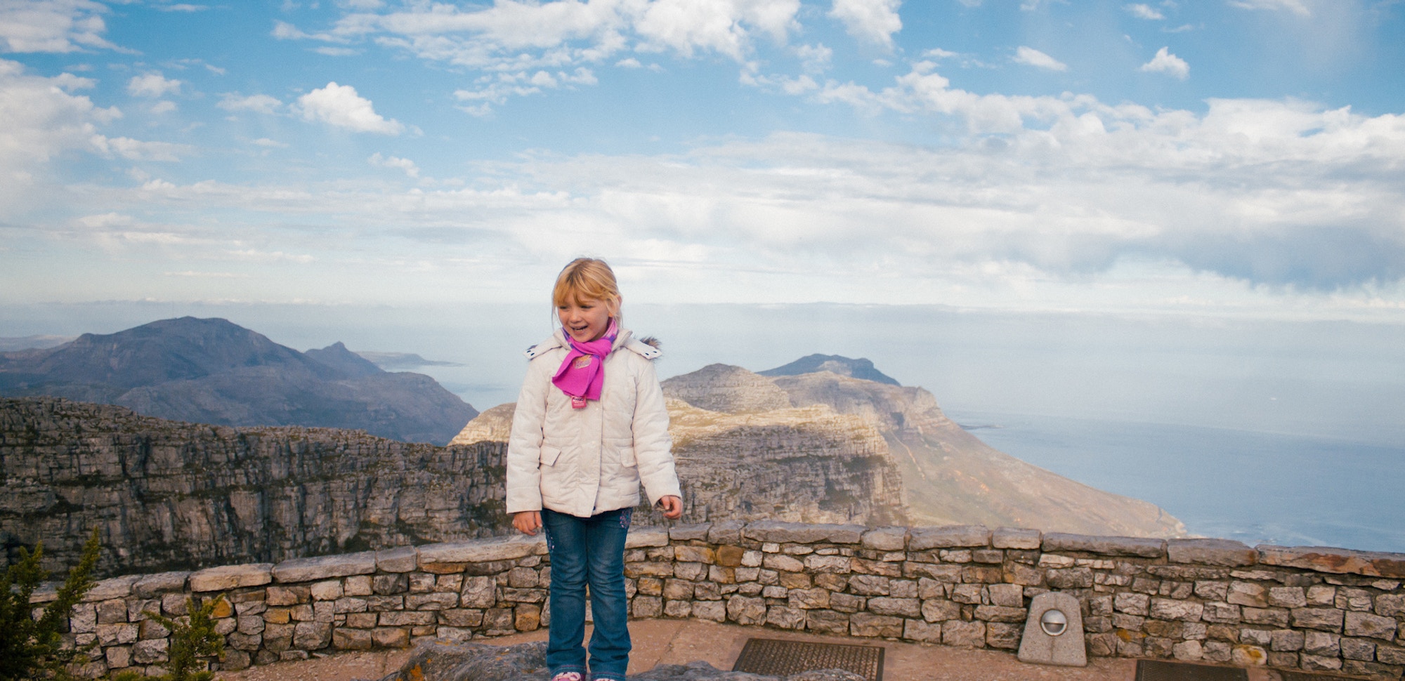 Kid enjoys the view on top of Table Mountain